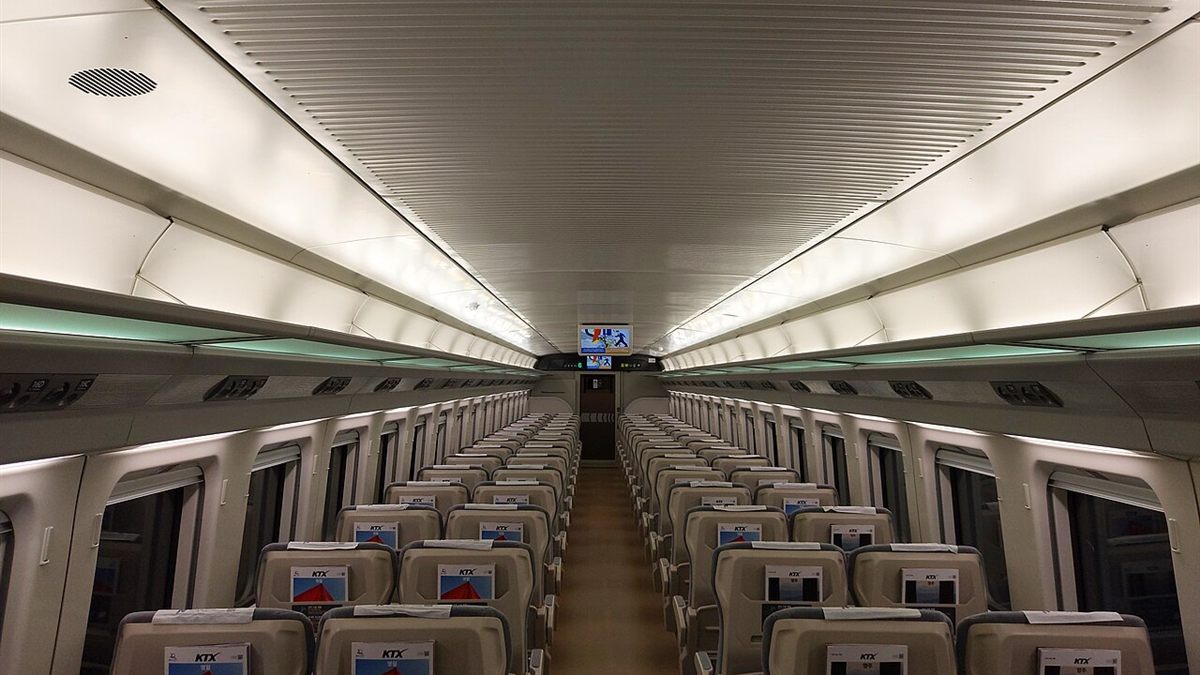 Rows of grey standard-class seats inside a KTX-Cheongryong carriage